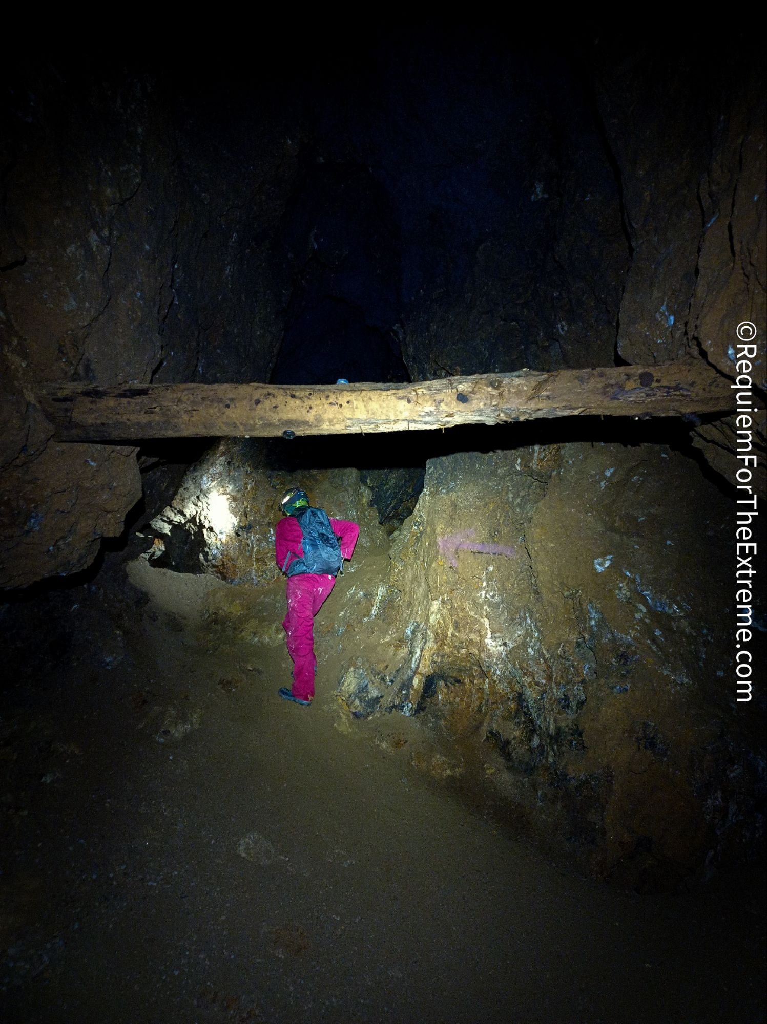 Andy ducks under a rotting timber in Wapping Mine, Matlock Bath